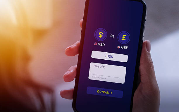 Currency converter app comparing exchange rates on smartphone